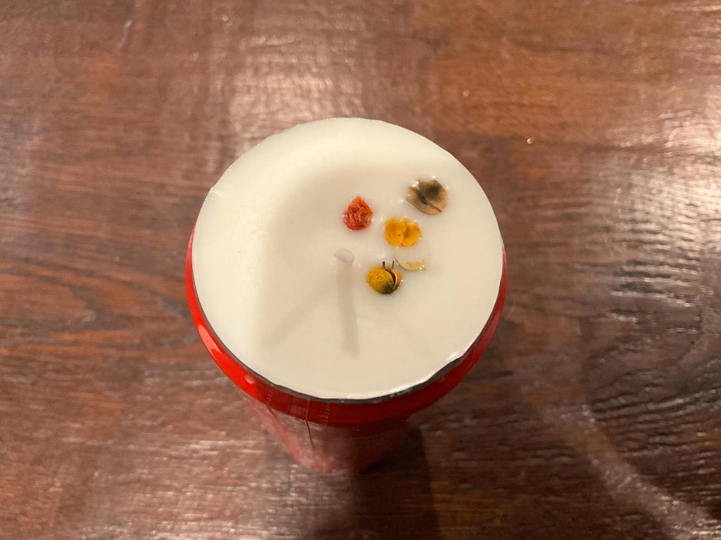 Bring a touch of Italian charm to your home with unique, hand-poured soy candles with light citrus scent crafted in repurposed Italian cans
