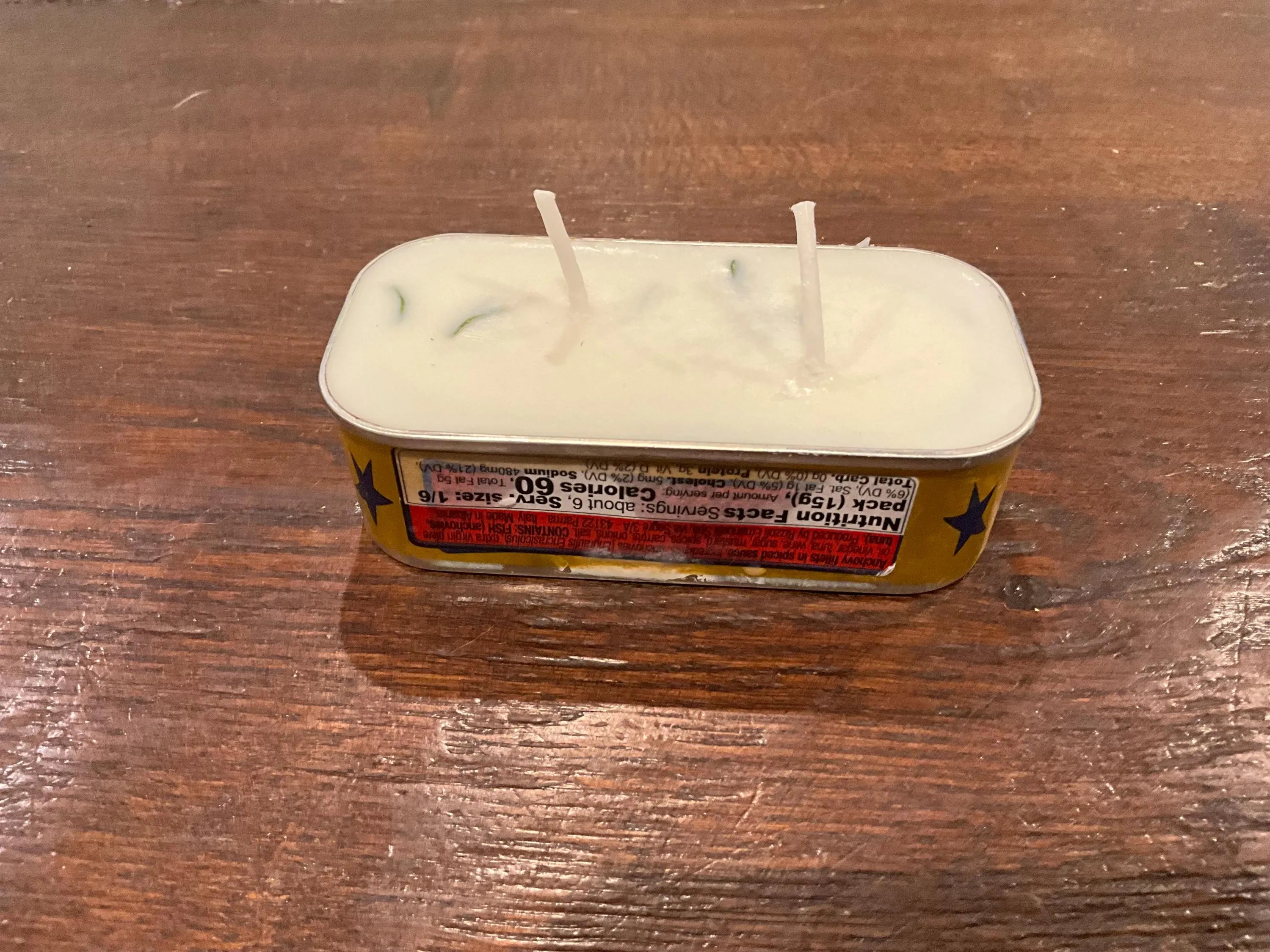 Bring a touch of Italian charm to your home with unique, hand-poured soy candles with light citrus scent crafted in repurposed Italian cans